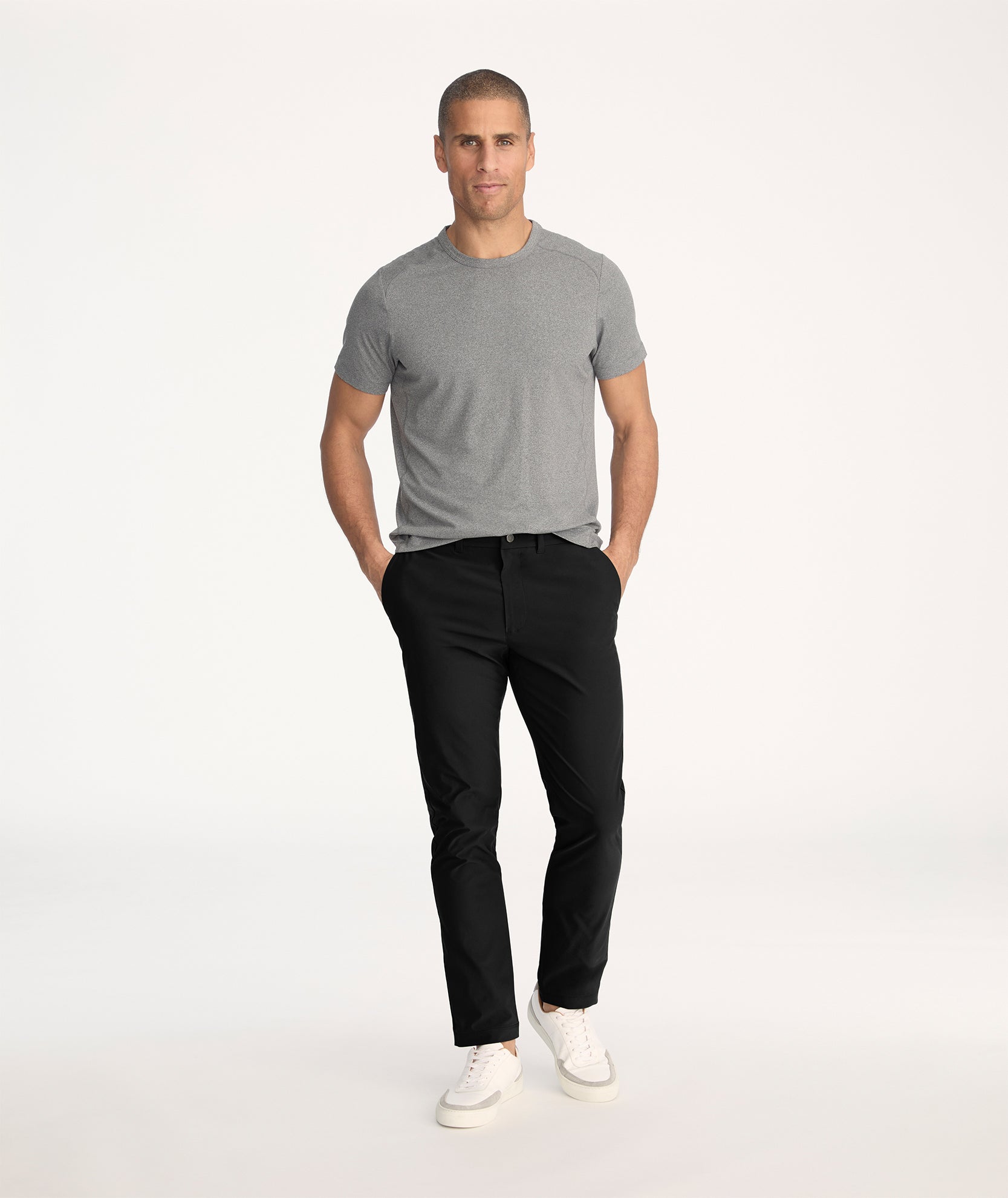 Model wearing Traveler Pant in black - full body