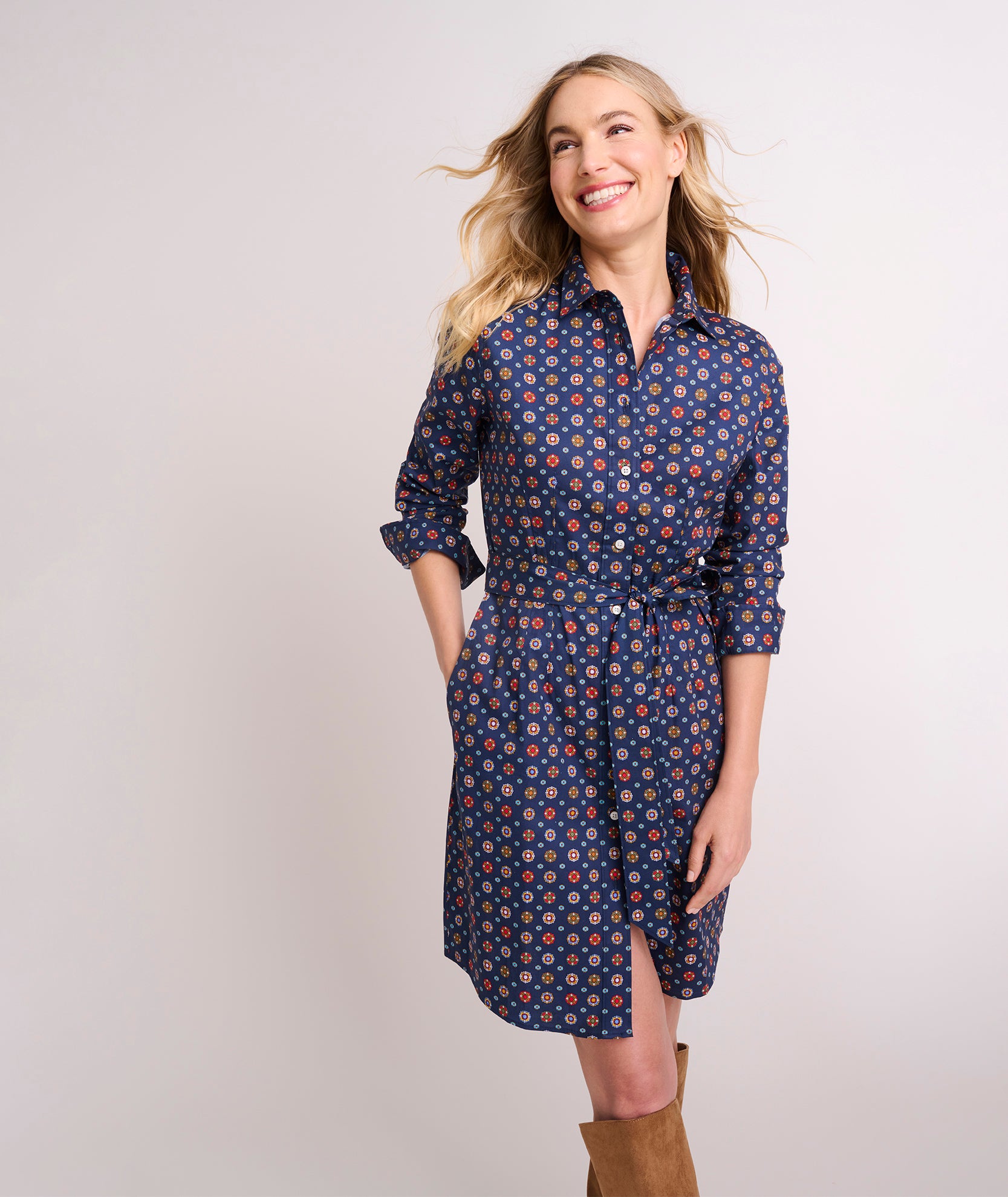 Model is wearing UNTUCKit Cotton Stretch Foulard Print Sydney Shirtdress. 