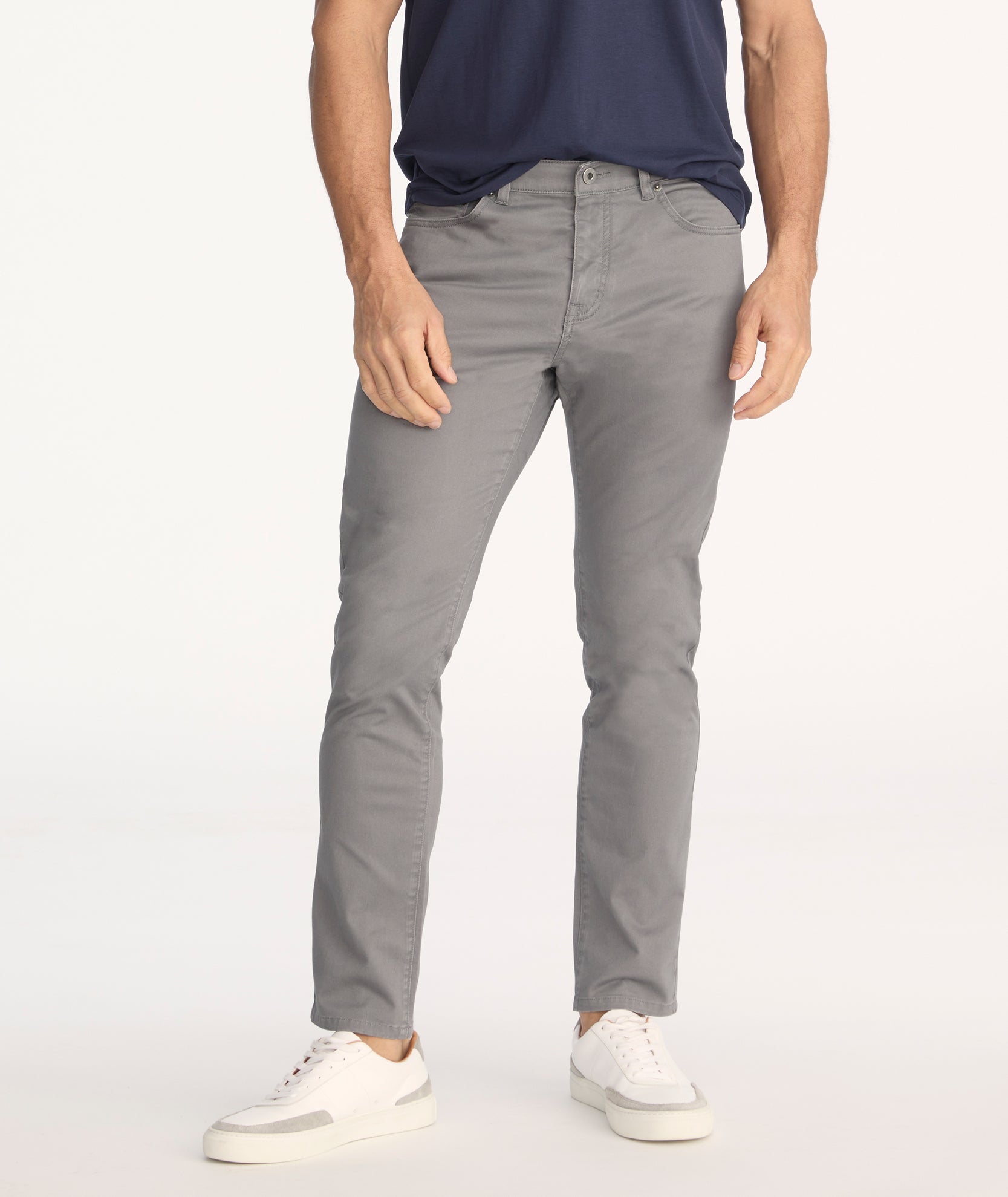 Model is wearing UNTUCKit 5-Pocket Chino Pants in Charcoal.