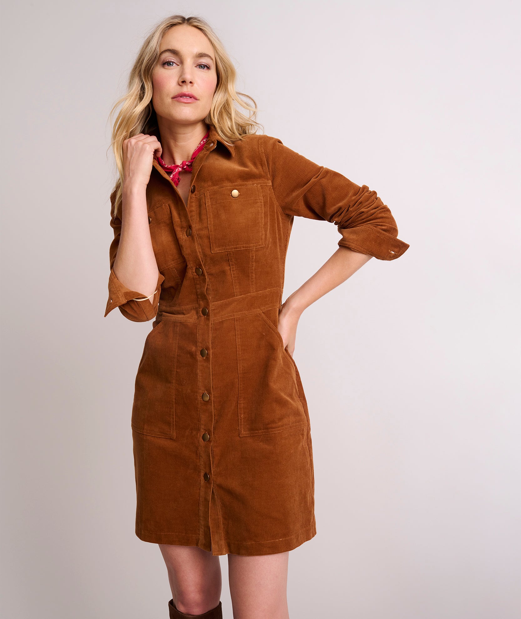 Model is wearing UNTUCKit Cord Solid Cora Shirtdress in Chestnut Brown Solid. 