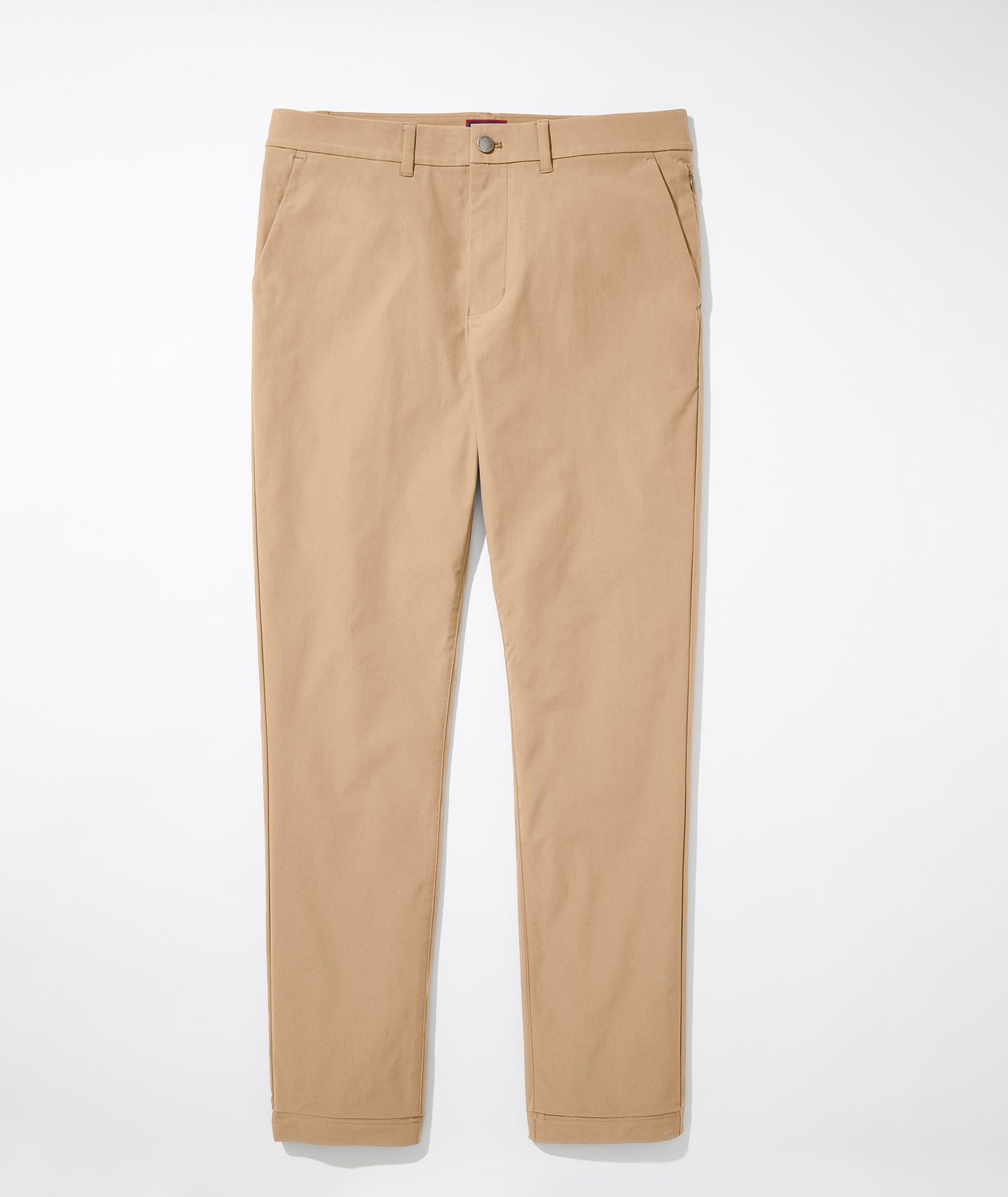 Model wearing Traveler Pant in tan - full body