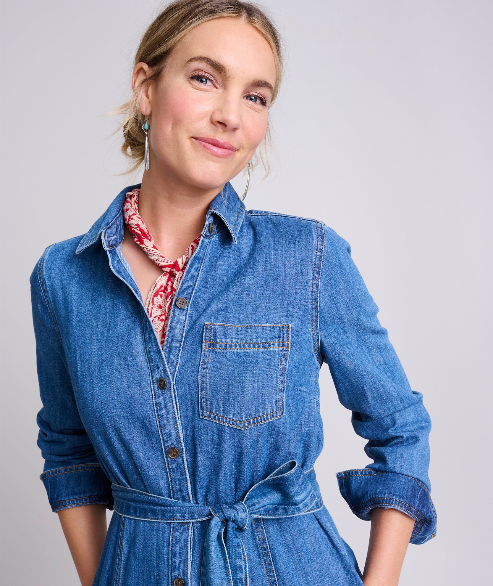 Model is wearing UNTUCKit Lea denim dress.