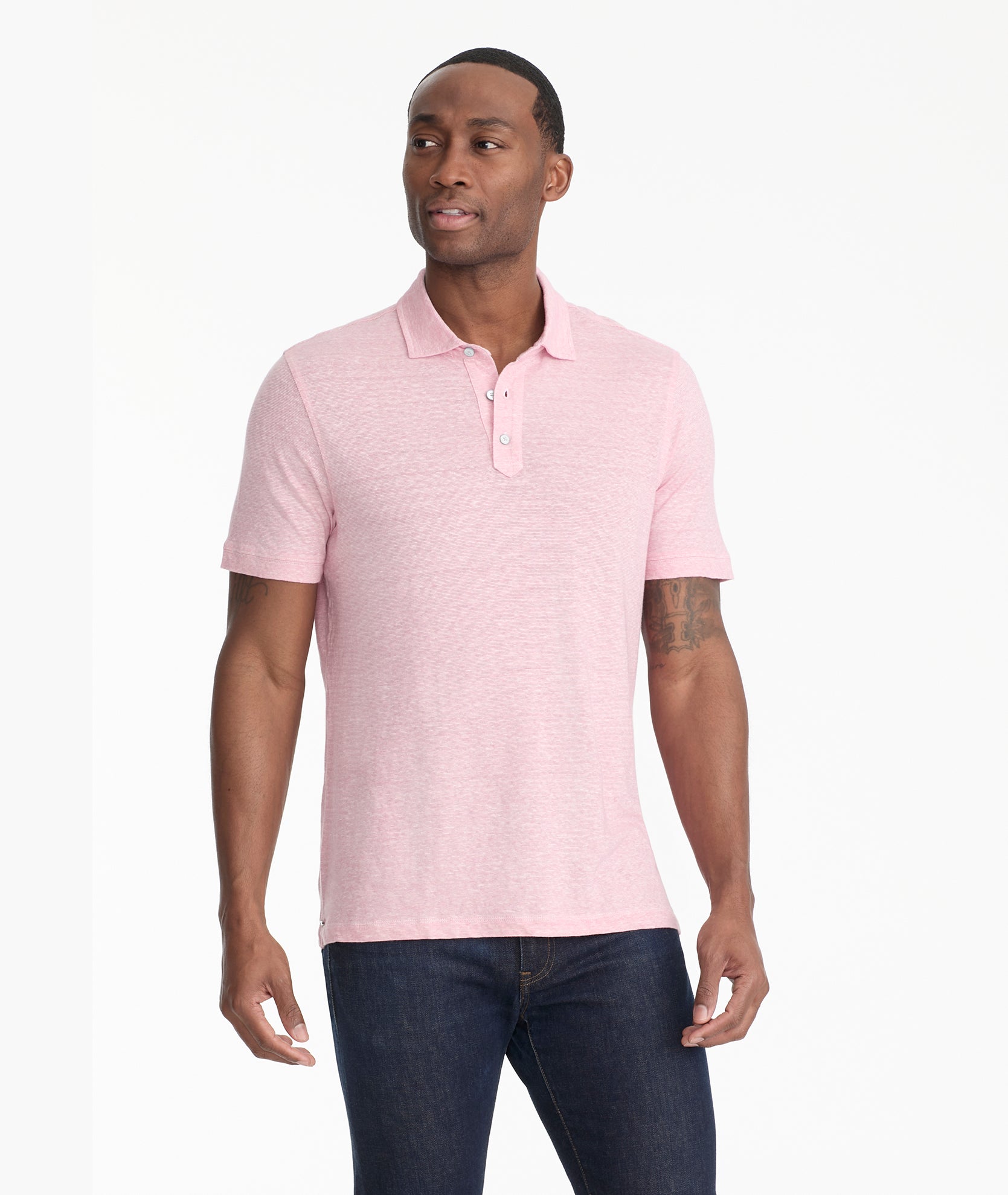 Model is wearing UNTUCKit Bardini Linen Blend Polo in Pink.