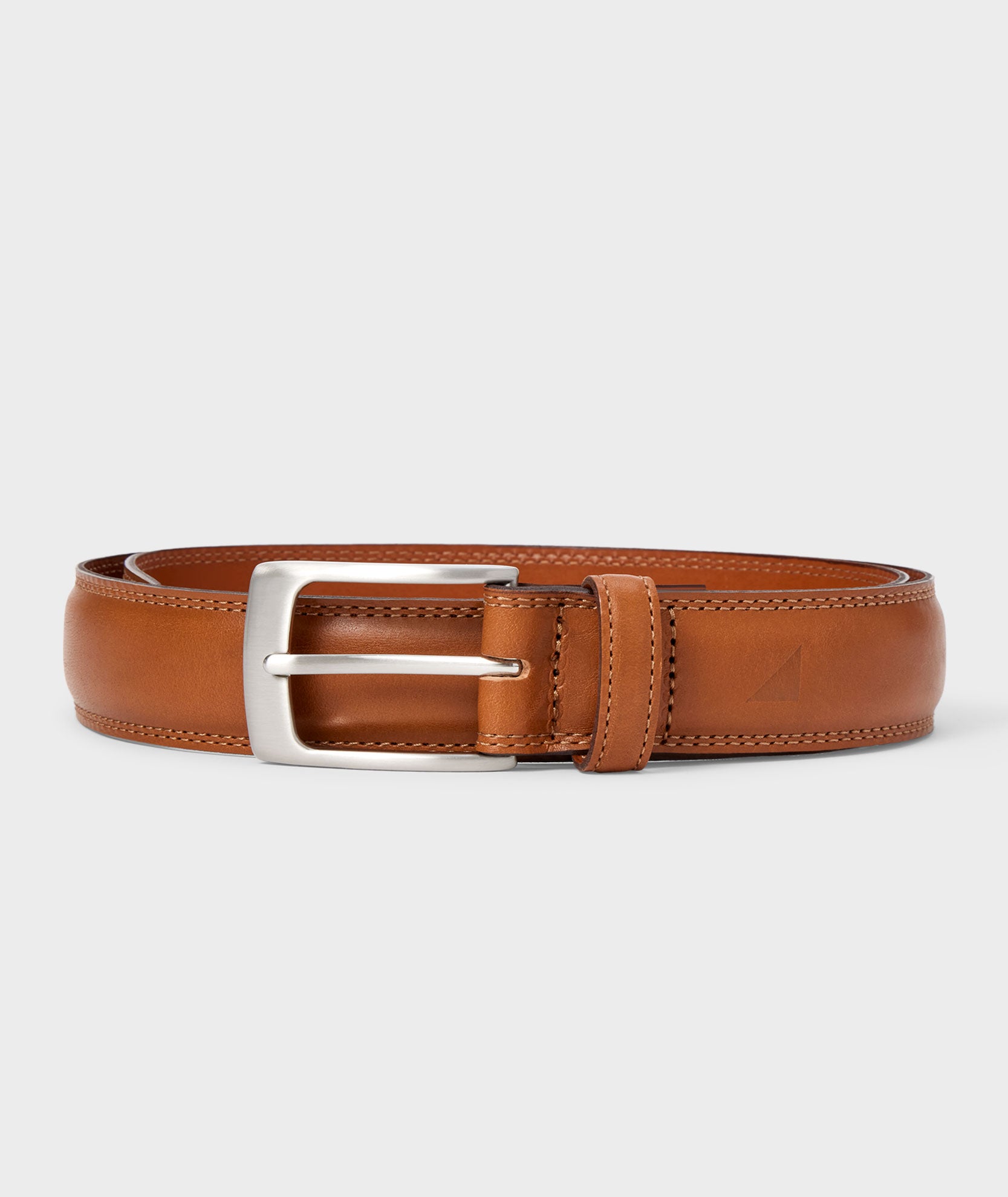 UNTUCKit double stitched Amber brown leather belt. 