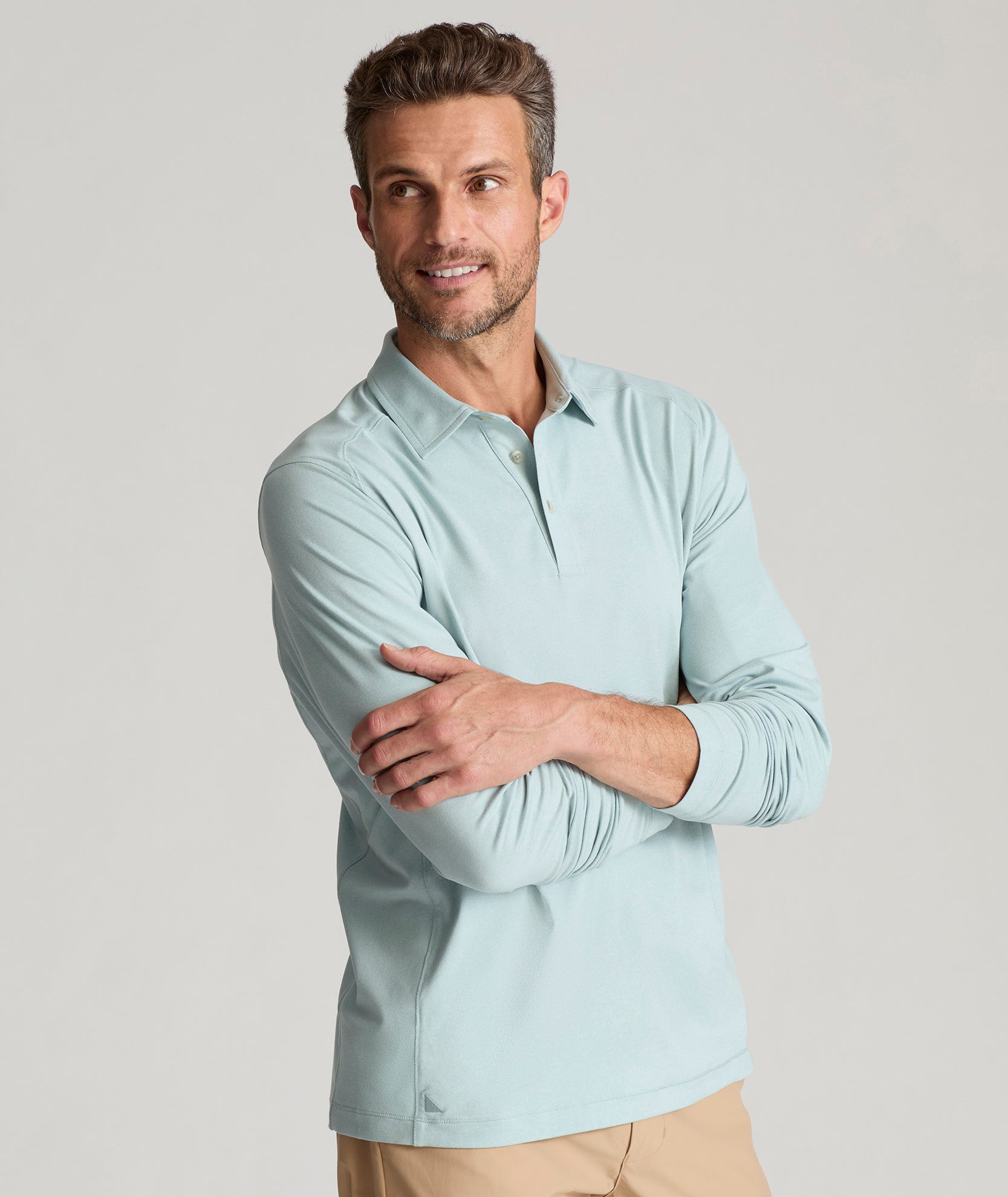 Model wearing an UNTUCKit Long-Sleeve Clavidor Polo.