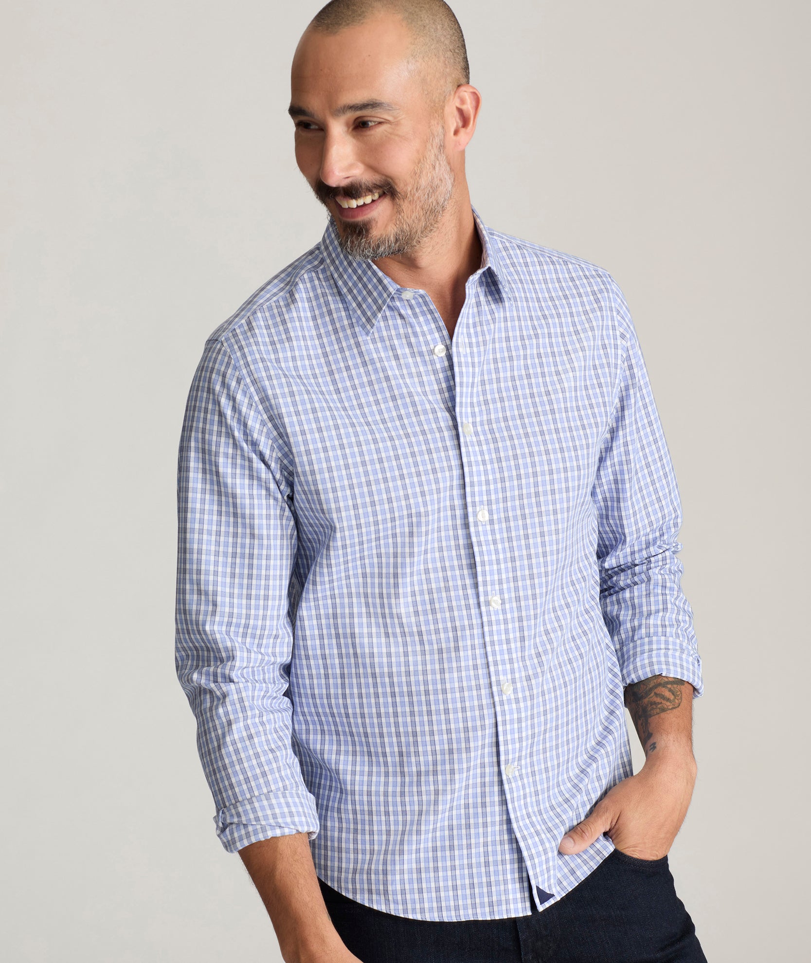 Model is wearing UNTUCKit durif wrinkle-free shirt. 