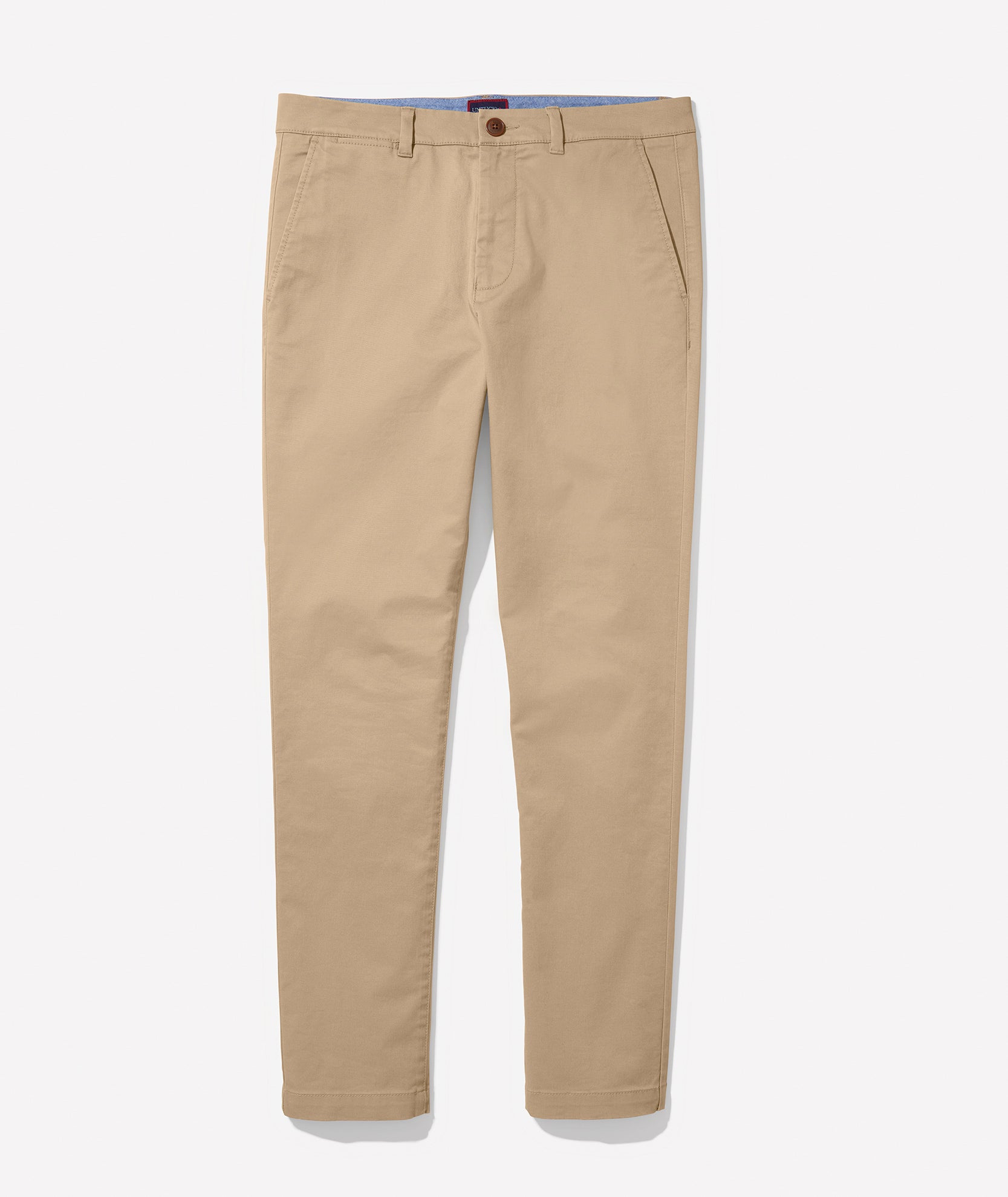 Model is wearing UNTUCKit Classic Chino Pants in Khaki.