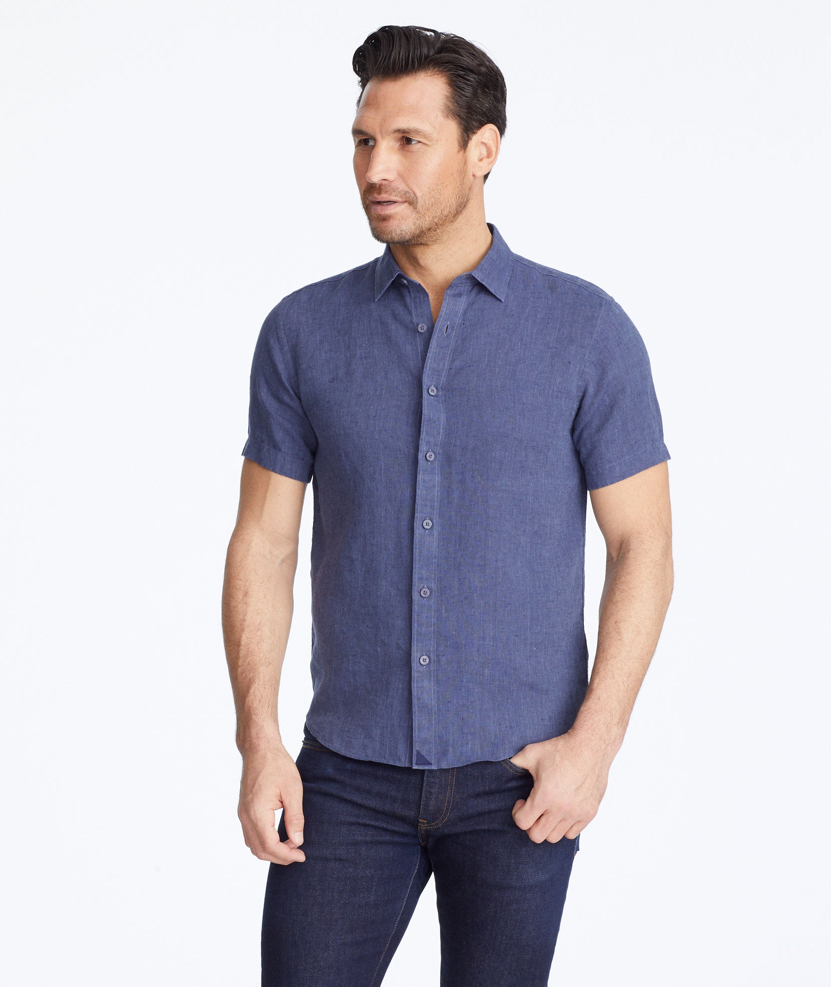 Model wearing a Navy Wrinkle-Resistant Linen Short-Sleeve Araujo Shirt