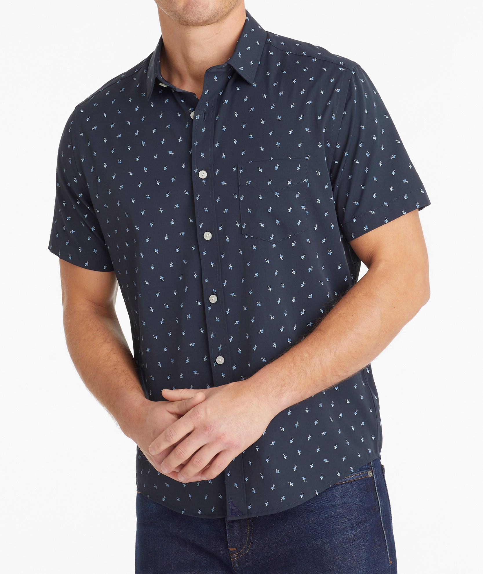 Model wearing an UNTUCKit Navy Wrinkle-Free Performance Short-Sleeve Flynn Shirt