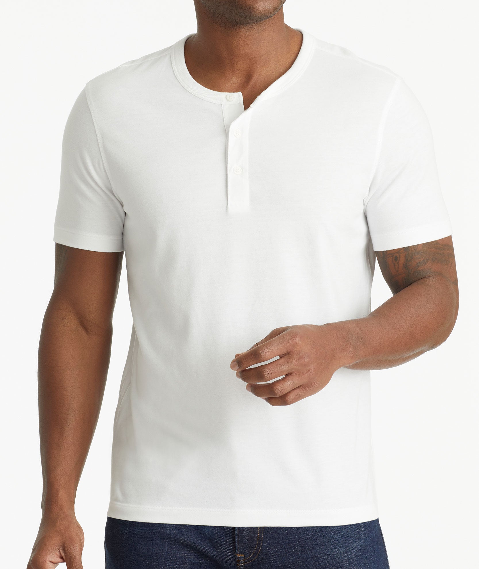 Model wearing an UNTUCKit White Ultrasoft Short-Sleeve Henley