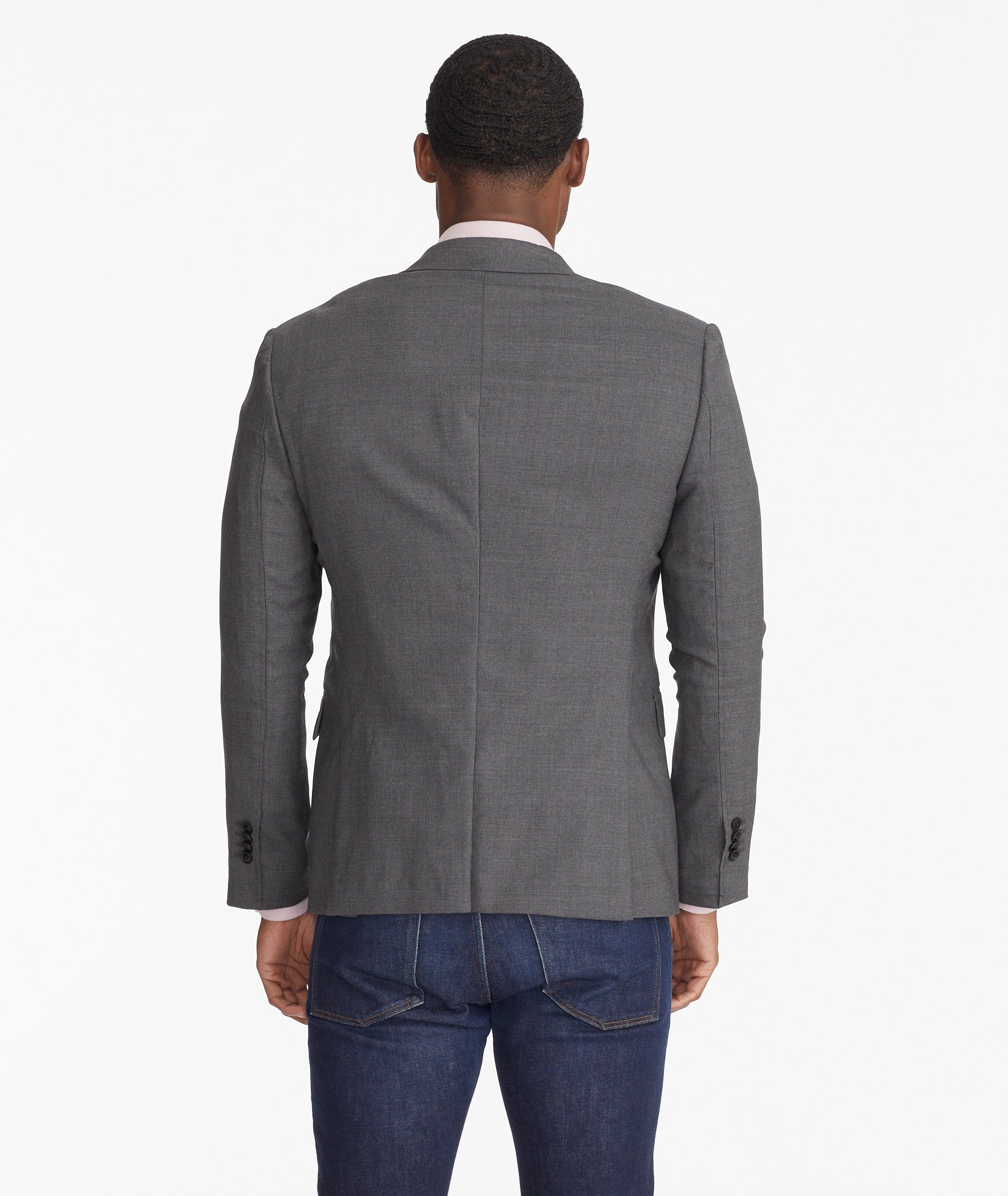 Model wearing an UNTUCKit Grey Wrinkle-Resistant Palazzo Sport Coat